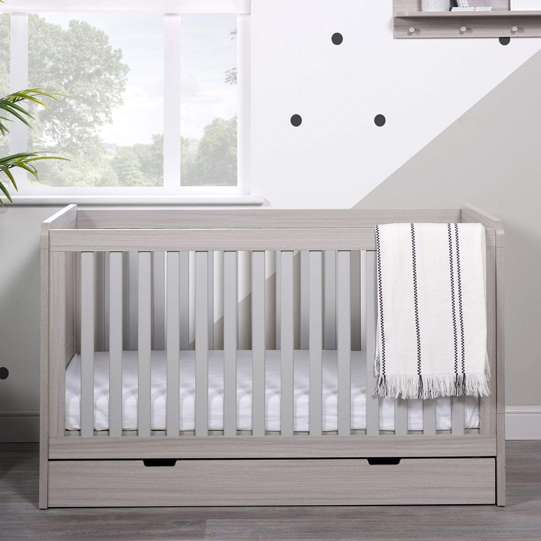 Grey cot and on sale changing unit